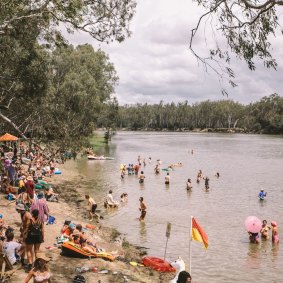 Festival goers enjoy swimming in the Murray at Strawberry Fields 2017.