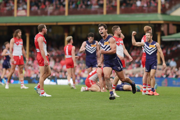 Lachie Schultz celebrates kicking a goal during the Dockers’ win over the Sydney Swans at the weekend.