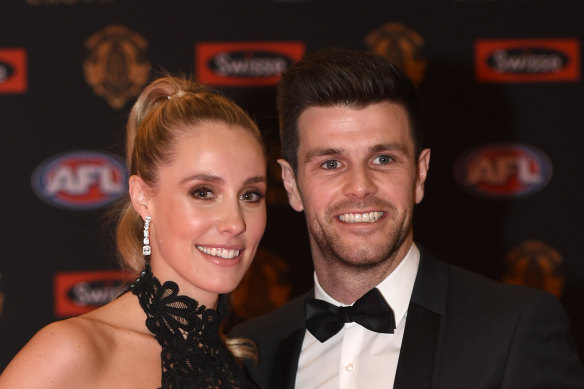 Brooke Cotchin, left, with her husband Trent Cotchin. 