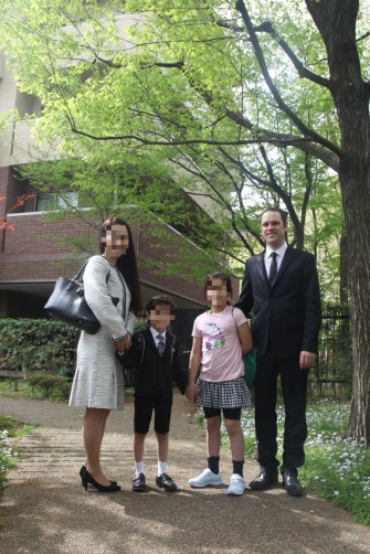 Scott McIntyre with his wife, Naoko, and their two children in happier times. He has not seen his kids since last May, when they went to stay with their Japanese grandparents for a night and never returned. 