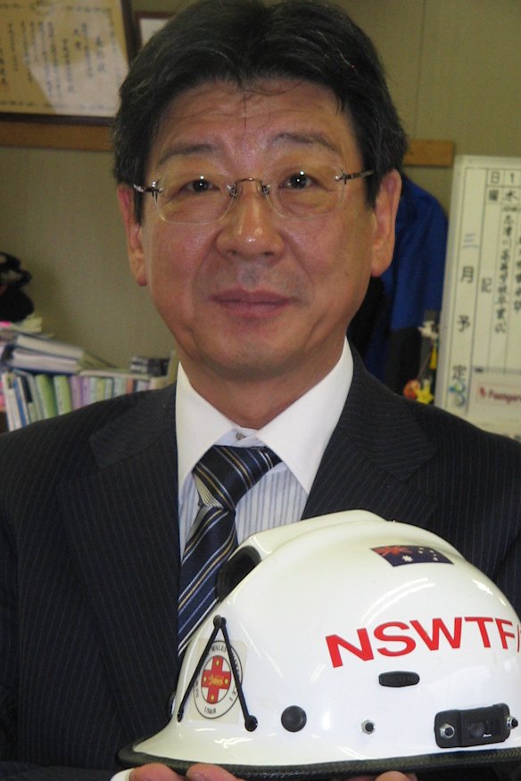 Minamisanriku mayor Jin Sato holds a treasured reminder of the immediate help Australia gave his town after the tsunami hit in 2011. 