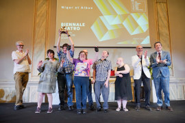 Members of Back to Back Theatre accept the prestigious Golden Lion for lifetime achievement.