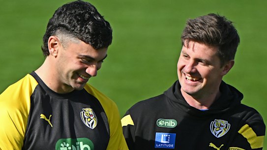 In good hands: Replacement Richmond coach Andrew McQualter chats with Tim Taranto on Tuesday.