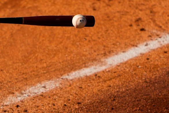 Texas Rangers’ Abimelec Ortiz fouls a ball off his bat against the Milwaukee Brewers during the sixth inning of a spring training baseball game in Surprise, Arizona.