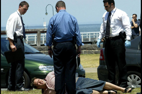 Police arrest Carl Williams on Beaconsfield Parade, Port Melbourne, in 2003.