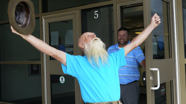 â€œRiver Daveâ€ reacts as he leaves Merrimack County Superior Court after a judge determined he would be able to collect his cats, chickens, and remaining possessions from the site he has lived on for 27 years. 
