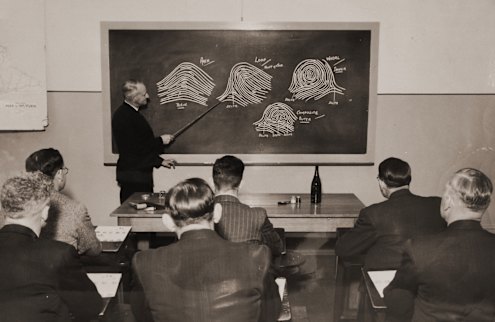 Alec Martin lecturing young detectives.