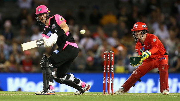Silky skills: Sydney Sixers' Jordan Silk cracks a ball to the boundary during his side's win over the Melbourne Renegades at Marvel Stadium in Melbourne.