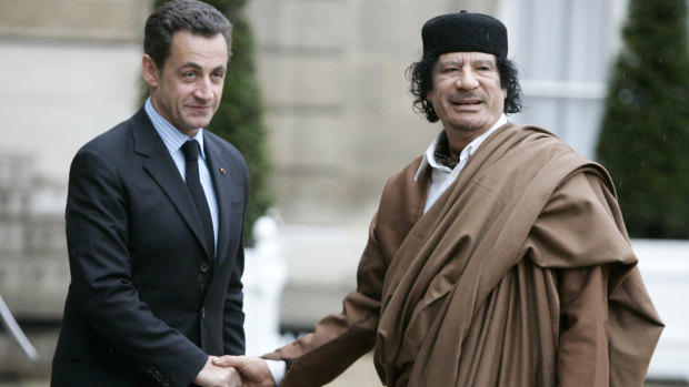 Libyan dictator Muammar Gaddafi (right) with then French president Nicolas Sarkozy in Paris in 2007.