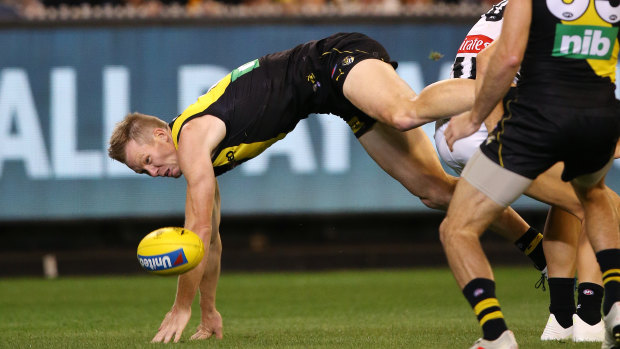 Hitting the turf: Richmond's Jack Riewoldt injured his wrist in this incident during the round 2 clash against Collingwood.