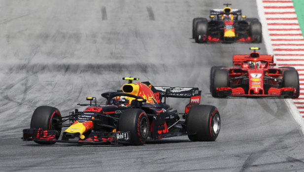 Red Bull driver Max Verstappen takes a curve ahead of Ferrari's Kimi Raikkonen and Red Bull's Daniel Ricciardo during the Austrian Formula One Grand Prix on Sunday.