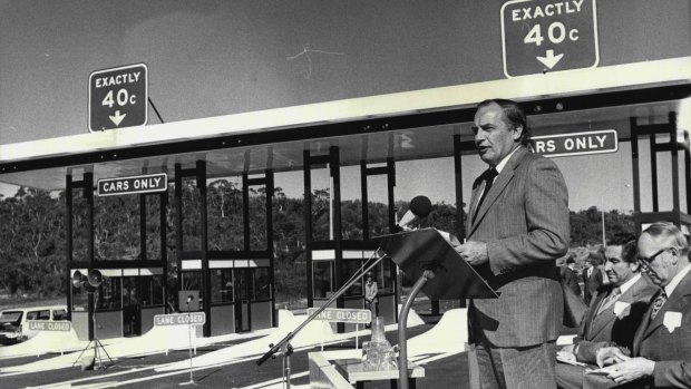 The NSW Premier, Mr. Tom Lewis, officially opening the new Waterfall to Bulli Pass tollway on July 24, 1975.