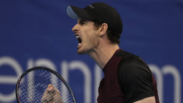 Powers coming back: Murray enjoys winning a crucial point against old sparring partner Stan Wawrinka.