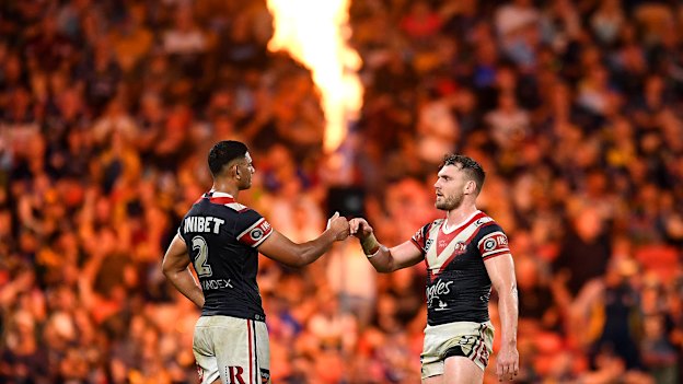 Daniel Tupou and Angus Crichton share a moment on the field during Magic Round in Brisbane.