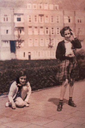 Hannah Pick-Goslar (right) and her childhood friend Anne Frank during a game of hopscotch in Amsterdam before the war.