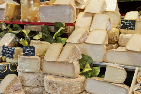 Cheese is produced in enormous quantities in France, making it cheaper.
