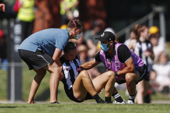 Imogen Barnett leaves the field. 