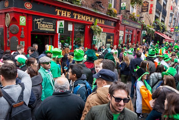 Crowds gather at Dublin’s Temple Bar on St Patrick’s Day.