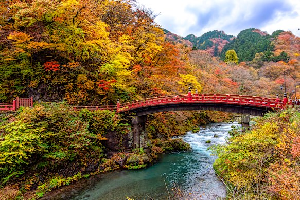 Nikko’s famous Shinkyo Bridge enveloped in autumn colours.