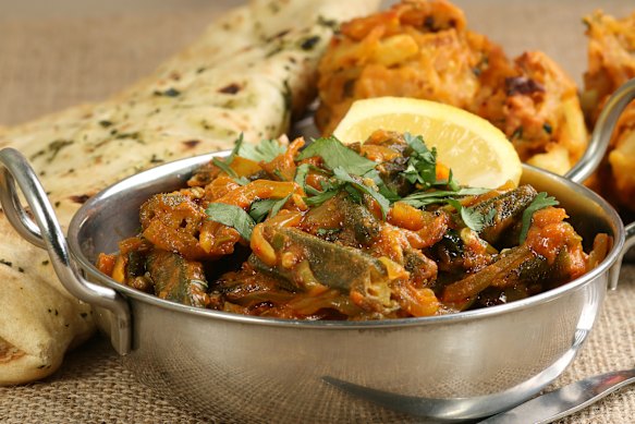 Bhindi masala: stir-fried okra stuffed with spices such as garam masala and black pepper.