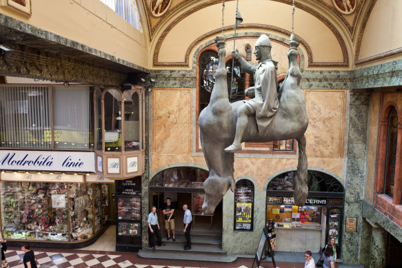 This mischievous statue is the work of Czech artist David Cerny.