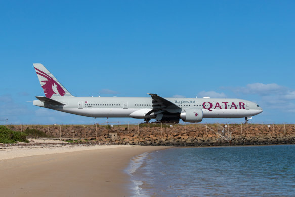 A Qatar Airways Boeing 777 taxiing at Sydney Airport. The airline’s request to increase flights on its Australian routes has been denied.