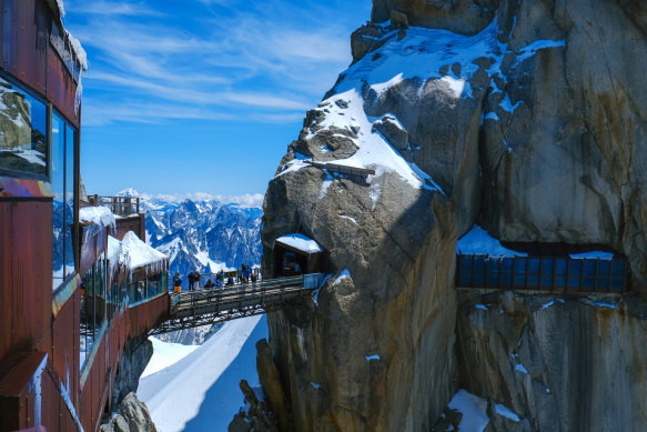 See the snow peaks of the French, Italian and Swiss Alps from Aiguille du Midi,