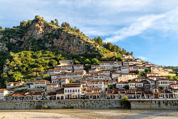 Berat, Albania, is known as the “city of a thousand windows” due to its distinctive white Ottoman-era houses. 