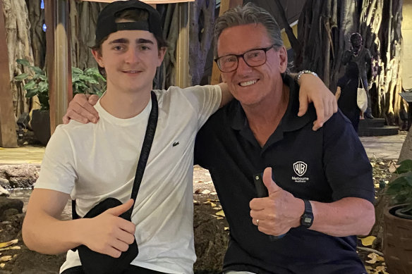 Wayne Holdsworth with his son Mac who took his own life in October 2023, aged 17, after becoming the victim of sextortion.