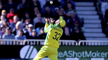 Glenn Maxwell takes a catch to dismiss West Indies' Andre Russell on Thursday.