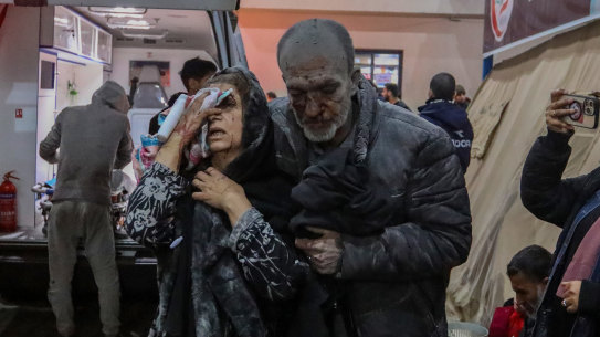 People injured in the Rafa air strikes which left 67 dead arrive at hospital.