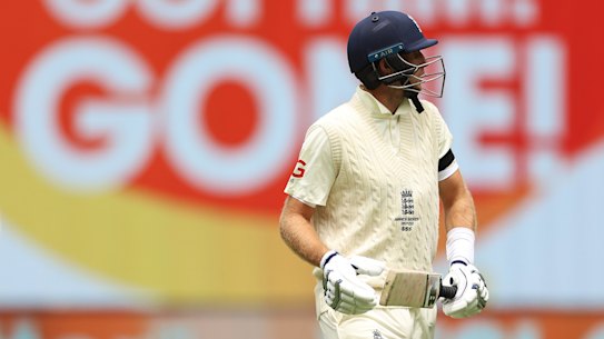 MELBOURNE, AUSTRALIA - DECEMBER 26: Joe Root of England looks dejected while leaving the field of play after being dismissed by Joe Root of Australia during day one of the Third Test match in the Ashes series between Australia and England at Melbourne Cricket Ground on December 26, 2021 in Melbourne, Australia. (Photo by Robert Cianflone/Getty Images)