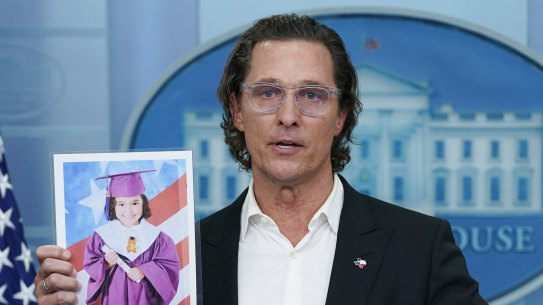 Actor Matthew McConaughey holds a picture or Alithia Ramirez, 10, who was killed in the mass shooting at an elementary school in Uvalde, Texas, as he speaks during a press briefing at the White House.