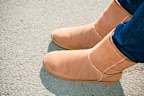 Ugg boots are sturdier and more durable than regular slippers so technically can be worn outside, but not everyone likes the idea.