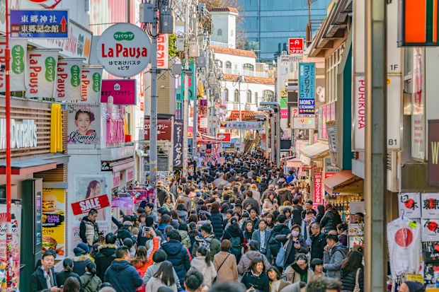 Crowded street at famous takeshita street, harajuku district, tokyo, japan