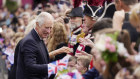Crowds welcome King Charles III to the royal family’s Belfast residence, Hillsborough Castle.