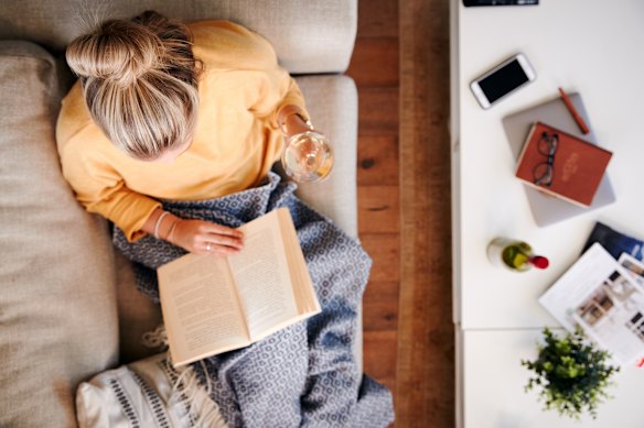 Feet up, good book, and a glass of wine makes a fine winter pastime.