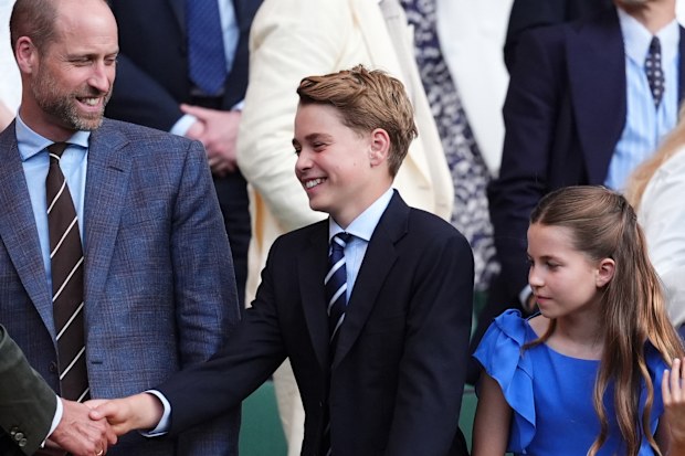German Chancellor Friedrich Merz, left, greets Prince William, Prince George and Princess Charlotte at the 2026 Wimbledon Tennis Championships at the All England Lawn Tennis and Croquet Club on July 12, 2026 in London, England.