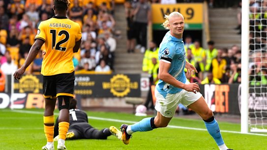 Manchester City’s Erling Haaland celebrates scoring his side’s third goal against Wolves. 