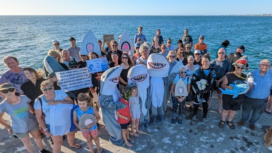 A “community photoshoot” held Thursday night to promote responsible fishing at Ammunition Jetty, Coogee. 