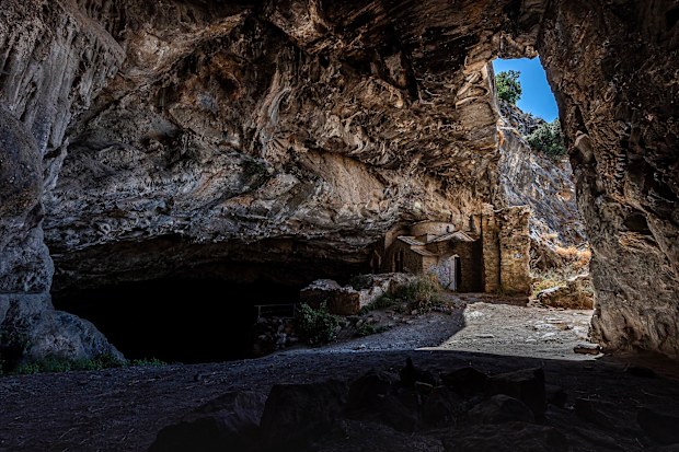 3. Davelis Cave on the mountain of Penteli, Attica, Greece, with the chapel of Saint Spyridon and the chapel of Saint Nikolaos. 