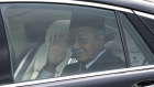 Mahathir Mohamad waves after being granted an audience with the Malaysia's King Sultan Abdullah Sultan Ahmad Shah at the National Palace in Kuala Lumpur.