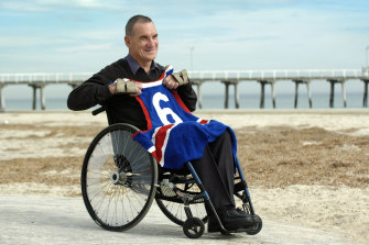 Neil Sachse with the jumper he was wearing on the day of his accident.