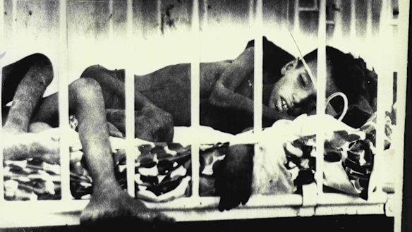 That was then, this is now. Two boys lie in an African hospital bed suffering measles, malnutrition and dedydration in 1973. 