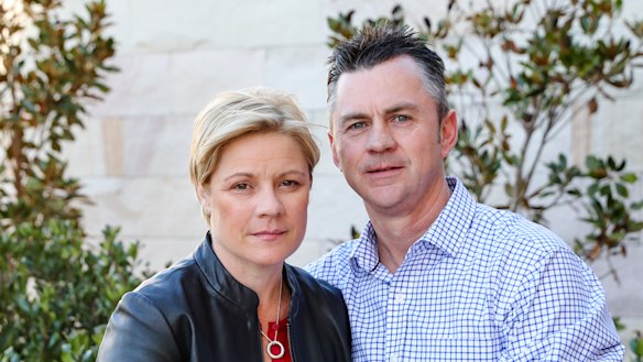 Jennie Ross-King with her partner Andrew Murphy outside the coronial inquest into the deaths of six young festivalgoers.