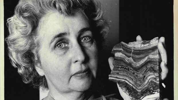 Paleobotanist Mary White pictured with a piece of stromatolite dated 3,500 million years old, the oldest recorded evidence of "plant" life, found in Western Australia. August 21, 1981.