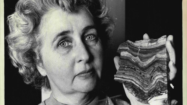 Paleobotanist Mary White pictured with a piece of stromatolite dated 3,500 million years old, the oldest recorded evidence of "plant" life, found in Western Australia. August 21, 1981.