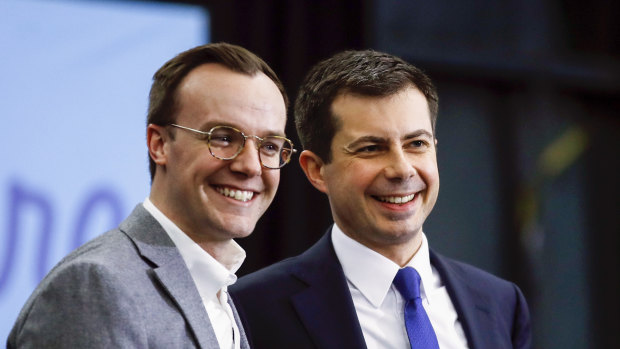 Then-mayor and US presidential candidate Pete Buttigieg, right, and his husband Chasten Buttigieg in 2020. 
