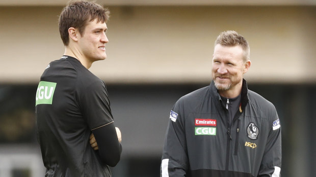 Nathan Buckley (right) with Darcy Moore at  training on Friday.