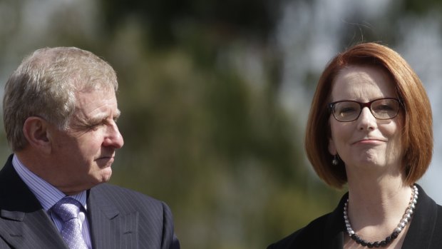 Julia Gillard and Simon Crean before their departures in 2013. 